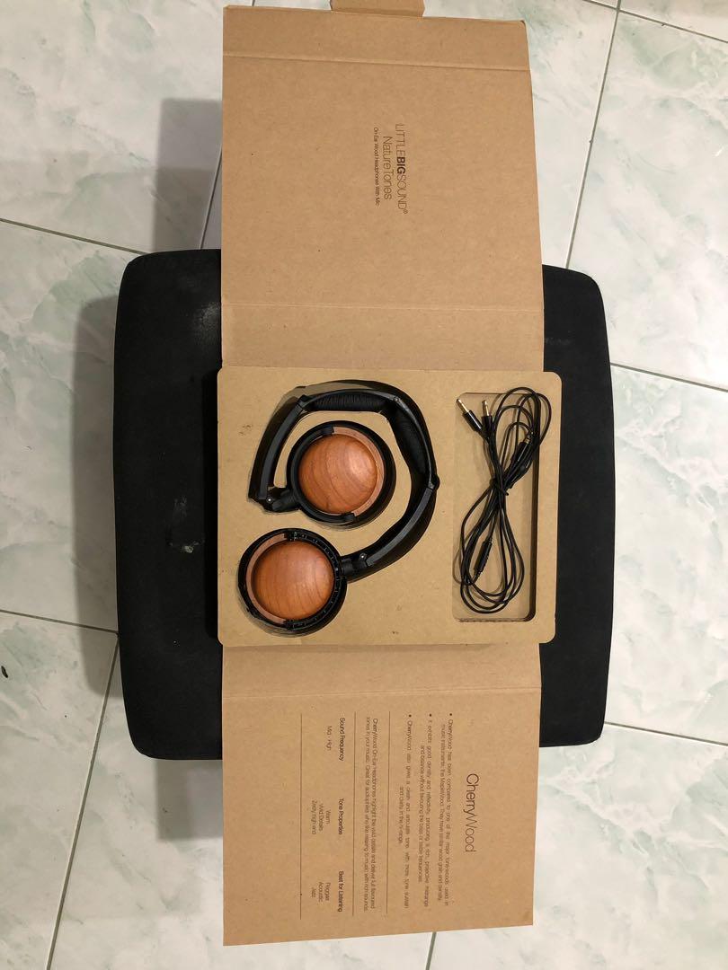 Over ear headset (Category: Headphones & Headsets) located in Pasig City. Submitted by seazone.deal (Listing ID 233469247, Image 2). Description: Little big sound natire tones on-ear wood earphones with mic CherryWood Best for listening: Reggae/Acoustic/Jazz Minimal issue on ear foam. Seldom used.