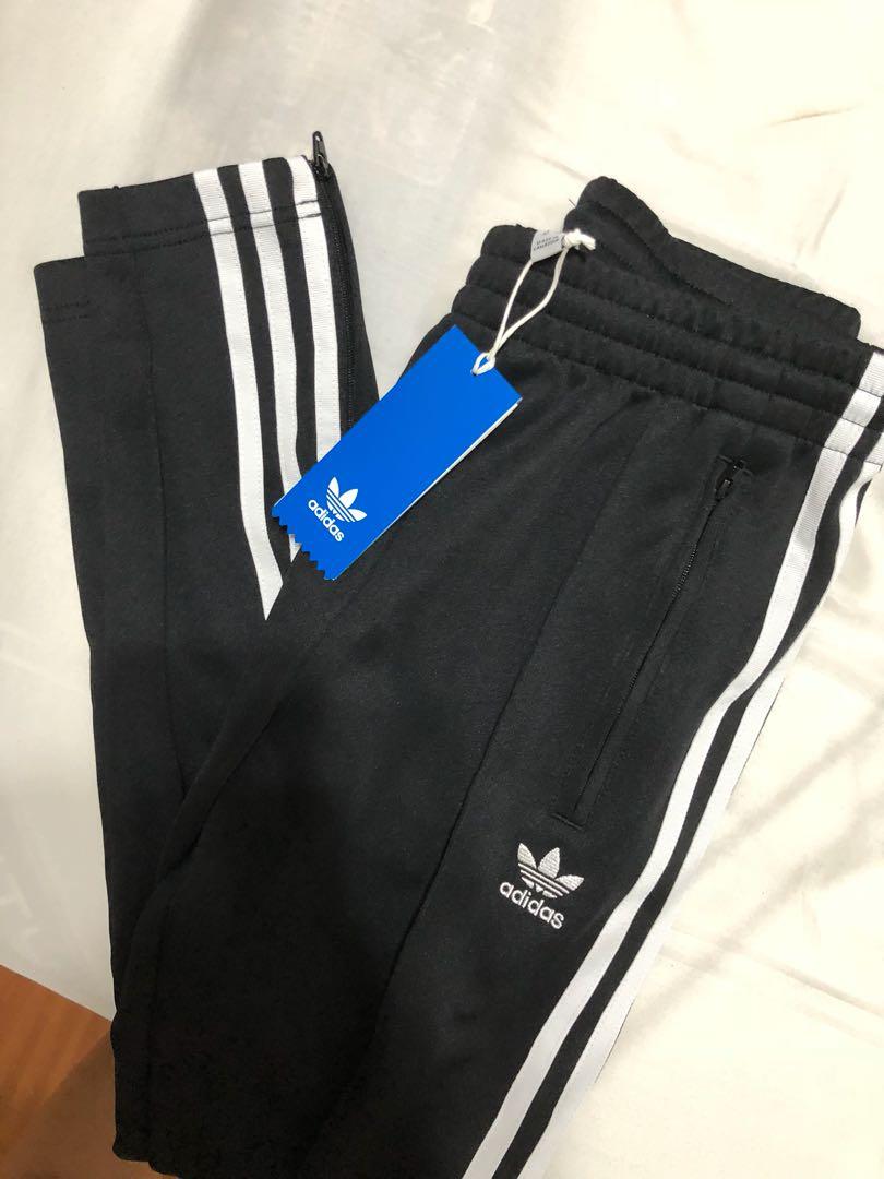 adidas originals adicolor three stripe track pants in black