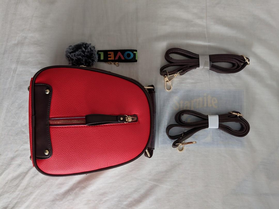 Chic Mini Backpack (Category: Shoulder Bags) located in Singapore. Submitted by woooodieee (Listing ID 233811605, Image 1). Description: Brand new mini backpack. Comes with keychain and detachable straps. Perfect for a chill day out. Received as a gift but selling cuz red isn't my colour. Meet-ups at Tampines, open to compromise if schedule permits!.