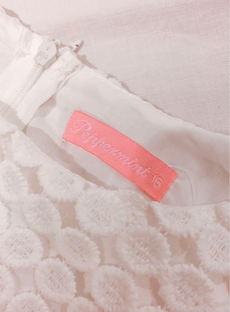 Peppermint White Dress (Teens) (Category: Dresses) located in Muntinlupa City. Submitted by andreadaniela (Listing ID 225513644, Image 2). Description: Excellent condition, worn only twice! Detailed white dress, flattering when worn! Size 16 on tag (best for ages 12-16/similar sizes) for skinnier body types with small bust.
