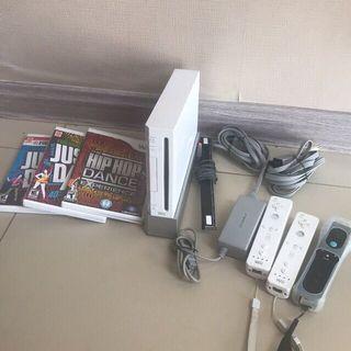 Wii Console with 3 Controllers and 4 Games