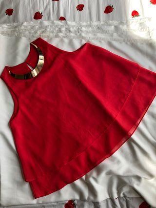 Top merah