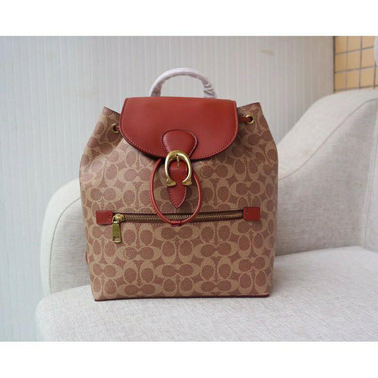 evie backpack in signature canvas