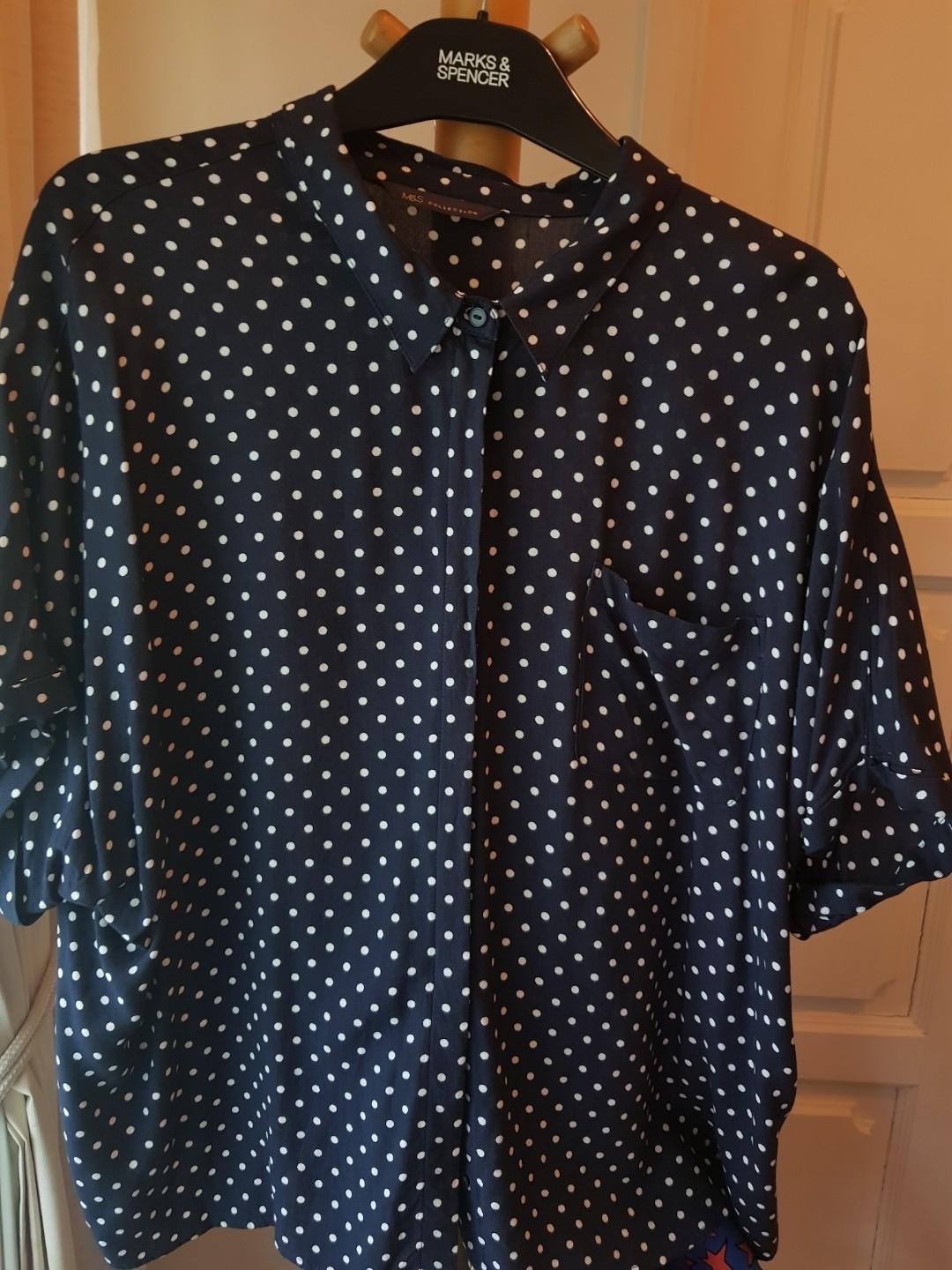 navy blue blouse with white polka dots