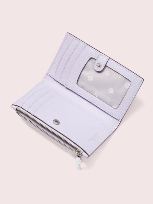 Sylvia perforated small on sale slim bifold wallet