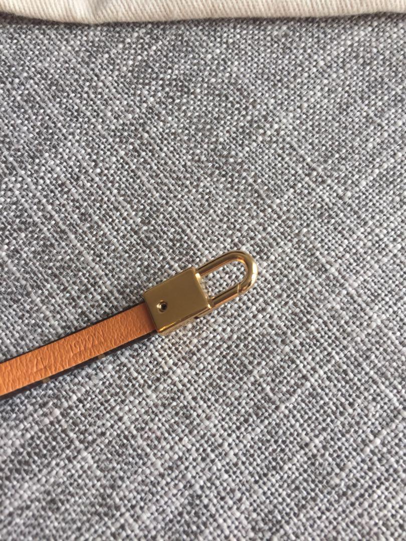 Louis Vuitton Crazy in lock Dark brown Leather ref.391380 - Joli