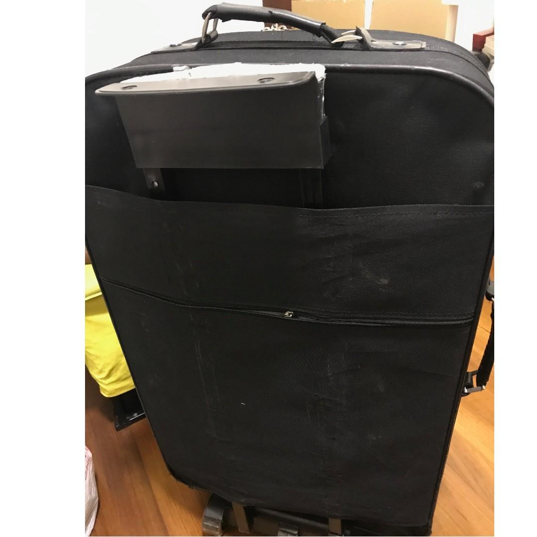 broken suitcase handle