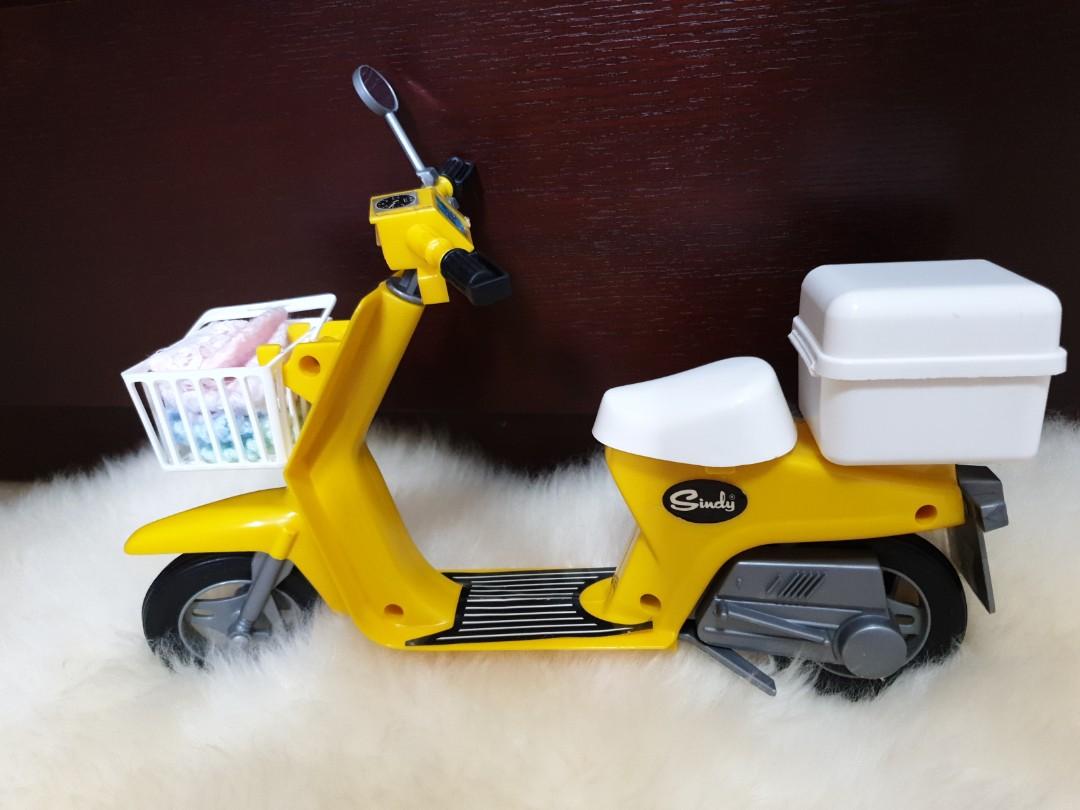 vintage scooter doll