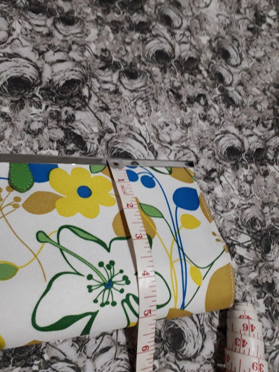Chinese Laundry Floral Clutch (Category: Clutches) located in Paranaque City. Submitted by 1tsmerach (Listing ID 234339656, Image 3). Description: Preloved and in excellent condition Floral Print Clutch with hinged opening Zipper pocket and card slot inside Measures 12 inches long and 5.5 inches in height Pls see photos RFS: decluttering Shipping fee c/o buyer BDO/BPI deposit.