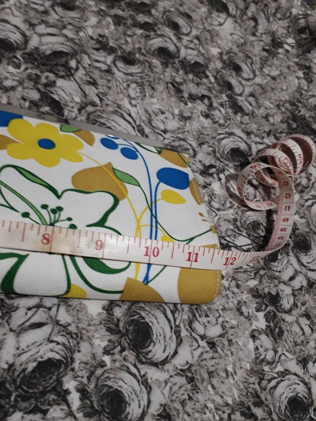 Chinese Laundry Floral Clutch (Category: Clutches) located in Paranaque City. Submitted by 1tsmerach (Listing ID 234339656, Image 2). Description: Preloved and in excellent condition Floral Print Clutch with hinged opening Zipper pocket and card slot inside Measures 12 inches long and 5.5 inches in height Pls see photos RFS: decluttering Shipping fee c/o buyer BDO/BPI deposit.