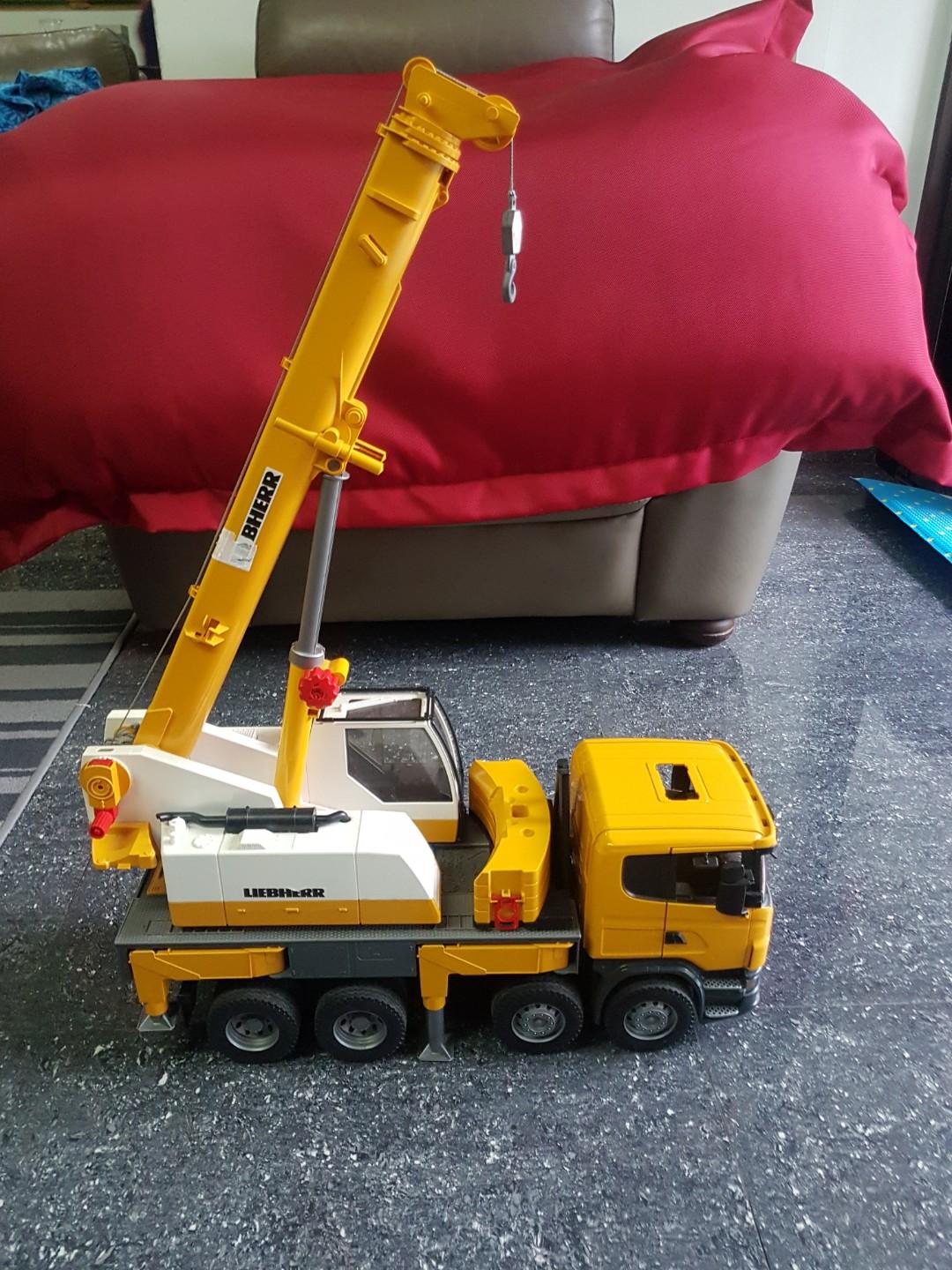 Liebherr toy crane truck hobbies toys toys games on carousell