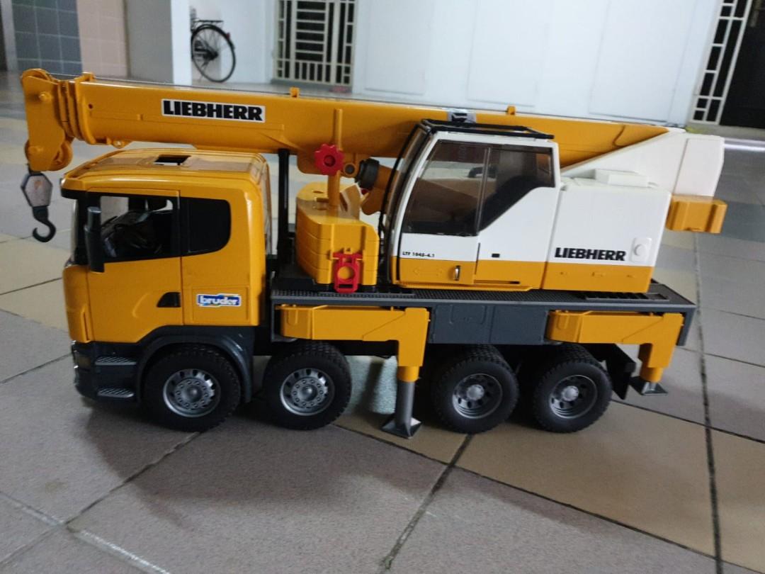 Liebherr toy crane truck hobbies toys toys games on carousell