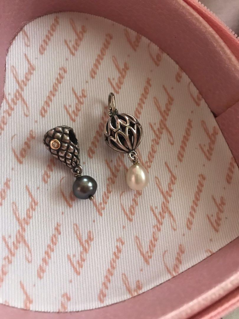 PANDORA Retired and HTF Charms (Category: Charms) located in Kalibo. Submitted by jayteeptrp (Listing ID 234523077, Image 1). Description: Pandora Grapebunch diamond TT grey pearl Charm Price: ₱3,500 Pandora Pearl Drop Pendant Price: ₱2,500 These are original and retired Pandora charms. Both items were bought in the UK. Both are in excellent condition. No inclusion but will be properly packed upon shipping. MOP: BPI deposit.