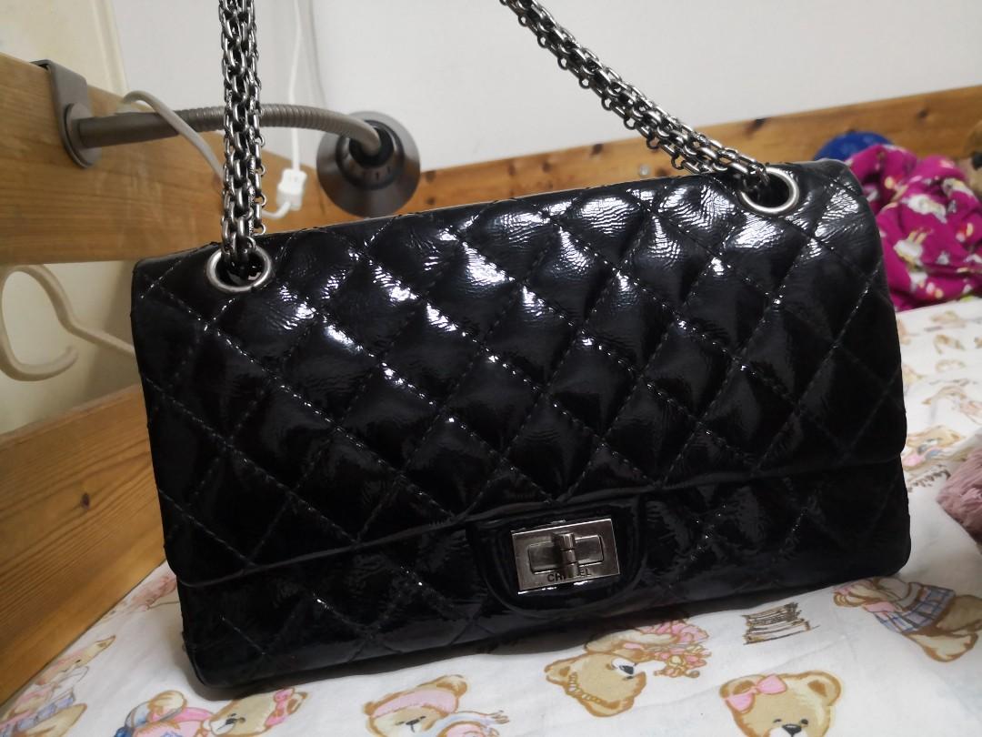 small black patent handbag
