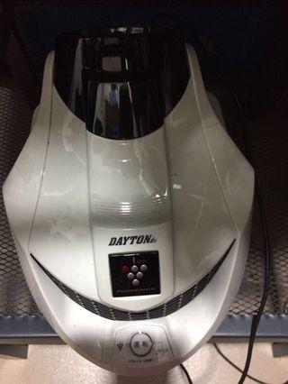 Motorcycle helmet storage and air cleaner