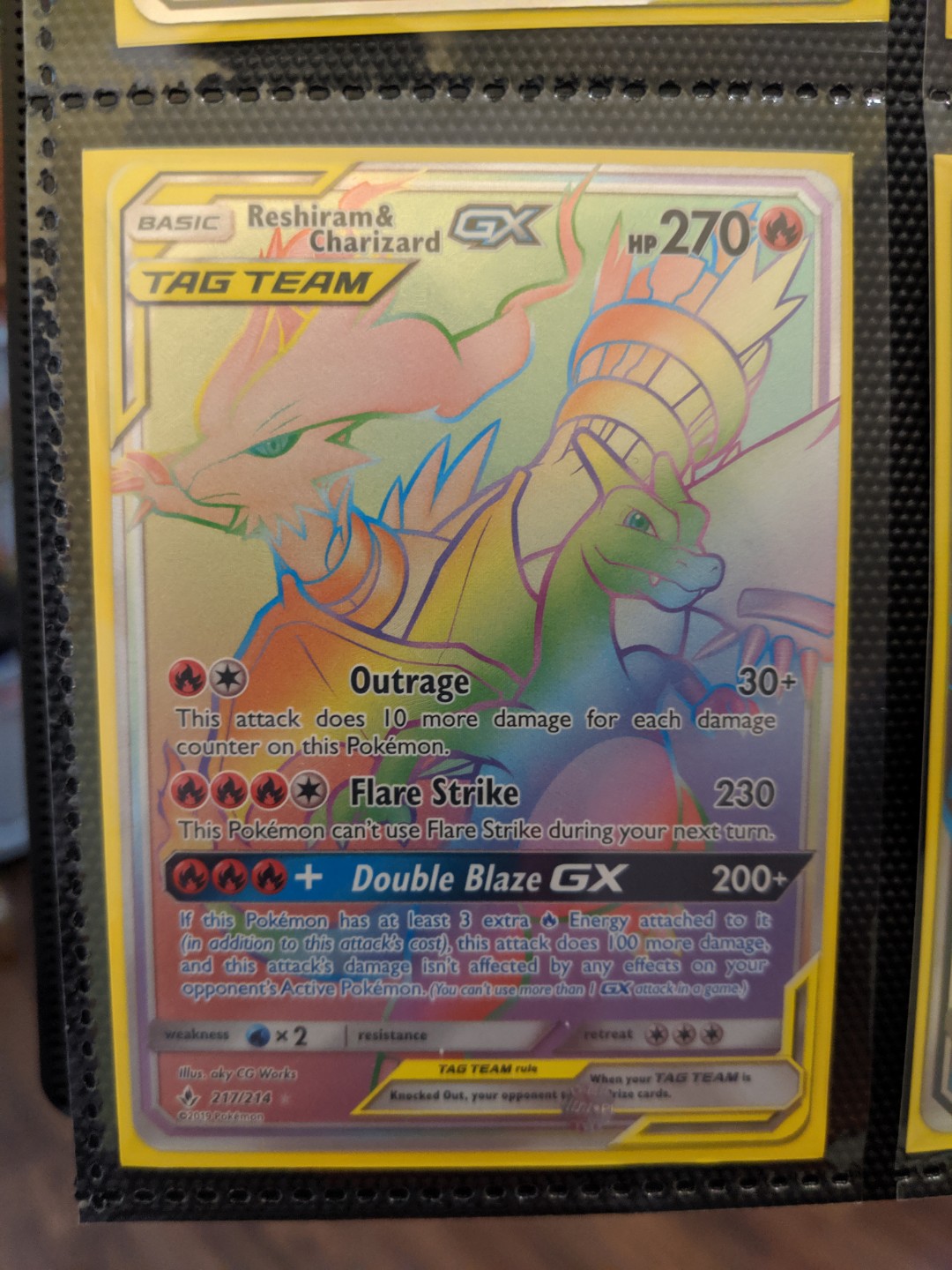 Reshiram & Charizard-GX (Rainbow Rare) - 217/214