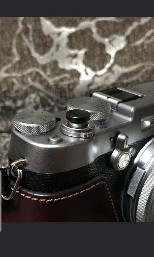 Camera soft shutter release button