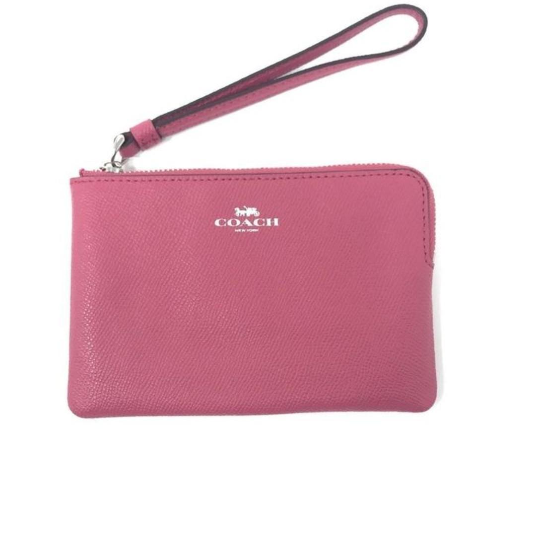 Pink coach wristlet wallet