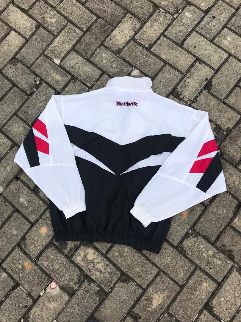 reebok half sleeve jacket