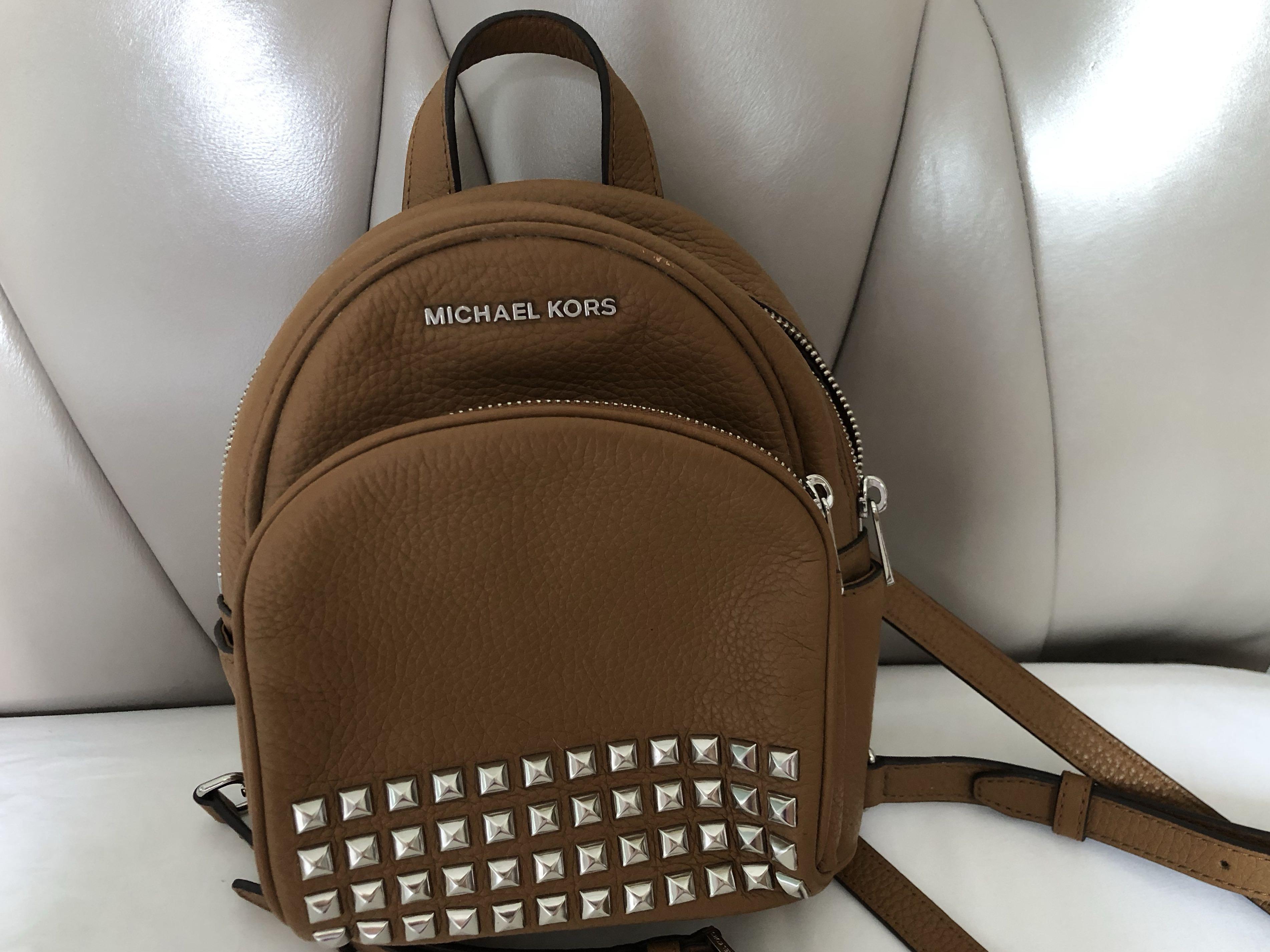 Michael Kors Elliot Extra Small Convertible Silver Zip Messenger Backpack |  Dillard's