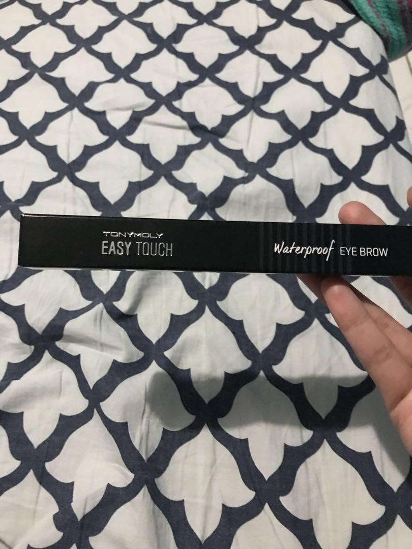 Tony Moly Easy Touch Waterproof Eyebrow 03 (Category: Face Care) located in Muntinlupa City. Submitted by thethriftyst0re (Listing ID 194147447, Image 2). Description: Bought yesterday for PHP295 at Tony Moly Store. I realized I have too much eyebrow pencil. Used only once. As in super bago pa. Very waterproof/sweatproof and stays all day on your brows. No need to retouch. Shade is grayblack/03. free shipping na po. Thanks!.