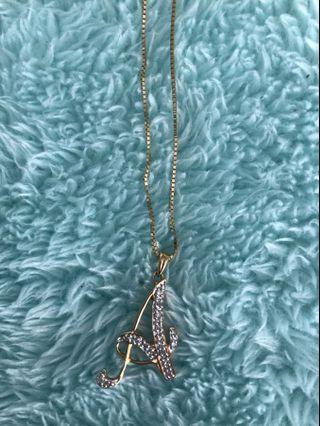 18 Karat gold “A” charm necklace