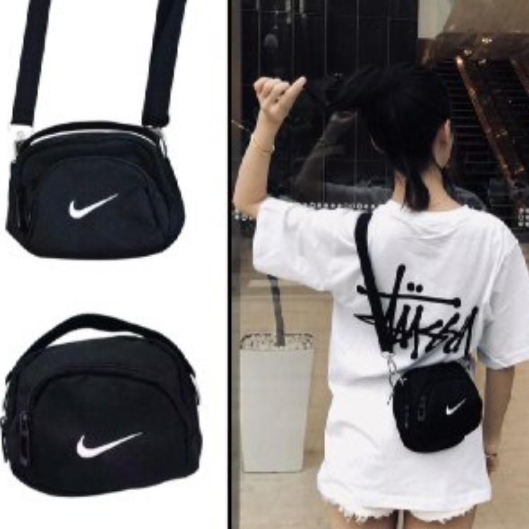 nike mini swoosh pvc sling bag