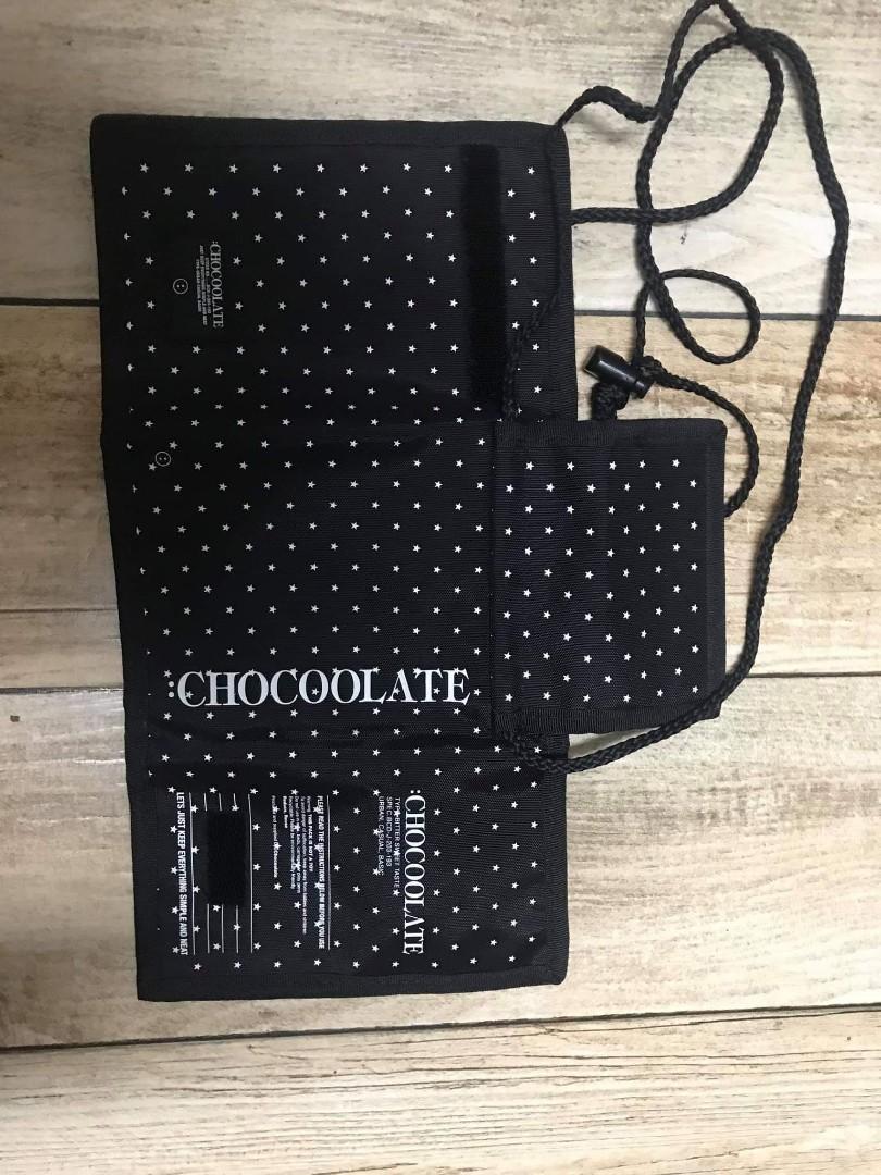 ORIGINAL HK BRAND CHOCOOLATE SLING BAG/WALLET (Category: Sling Bags) located in Mandaluyong City. Submitted by telesthesiaph (Listing ID 235389126, Image 2). Description: ORIGINAL HK BRAND :CHOCOOLATE 100% ORIGINAL PRELOVED BUT WELL LOVED 9/10 VUC BLACK WITH WITH DOTS UNISEX #July77.
