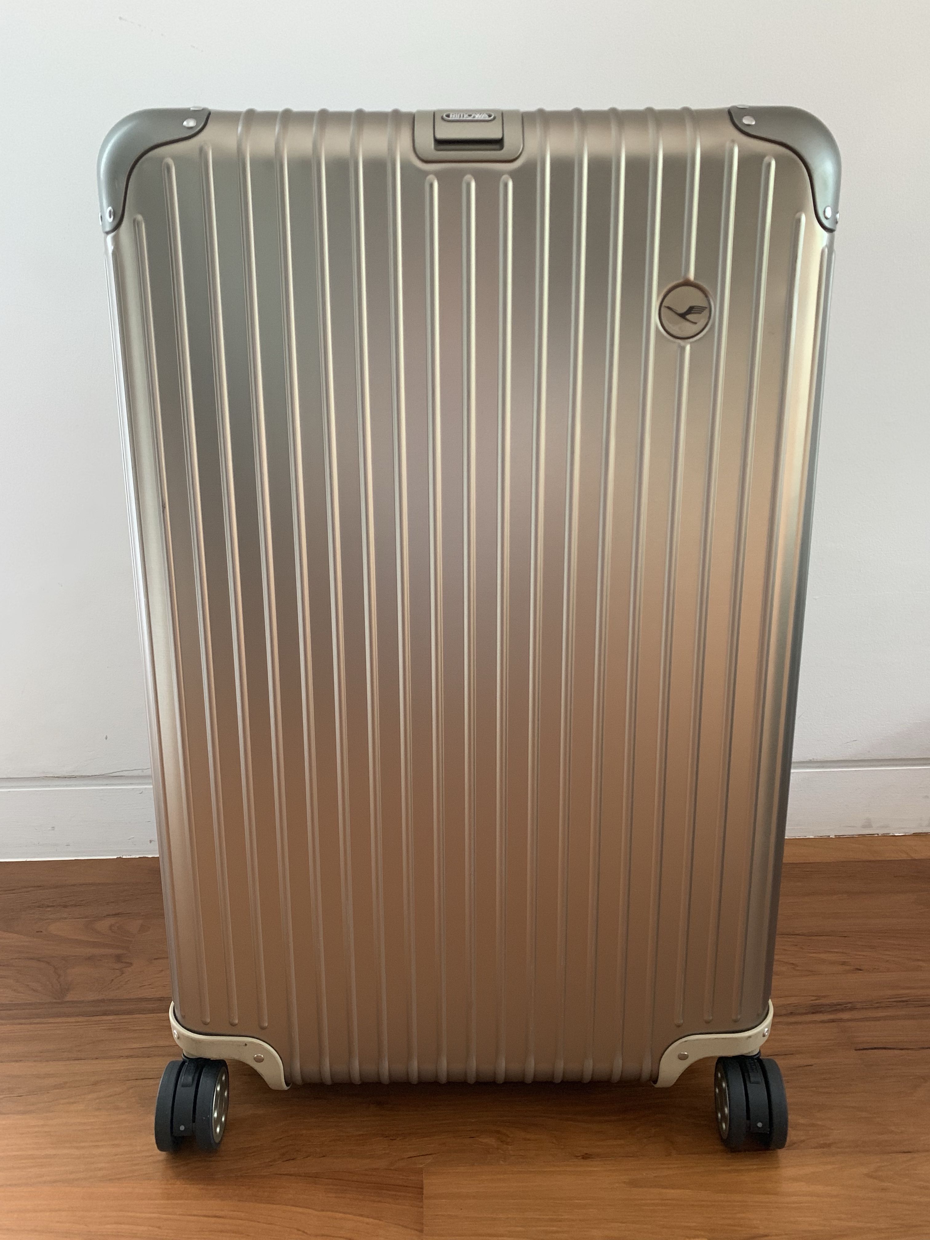 rimowa gold suitcase