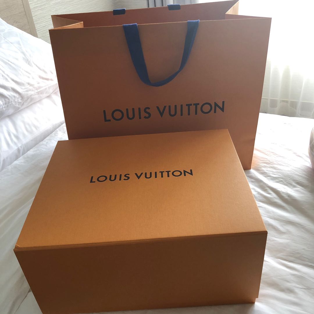 Classic Famous Louis Vuitton Orange Product Box Packaging with a Bow Free  Stock Photo  picjumbo