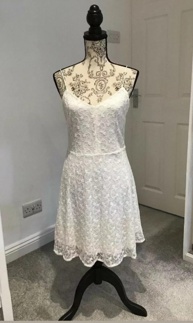 mango suit white dress Its flowing silhouette A classy white summer dress
