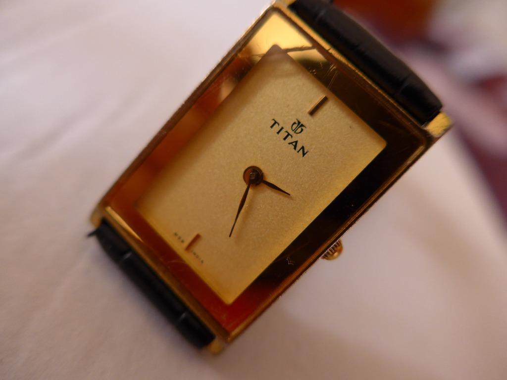 Titan quartz 18k gold plated sales price