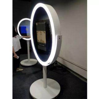 Floor standing oval-shaped mirror photo booth