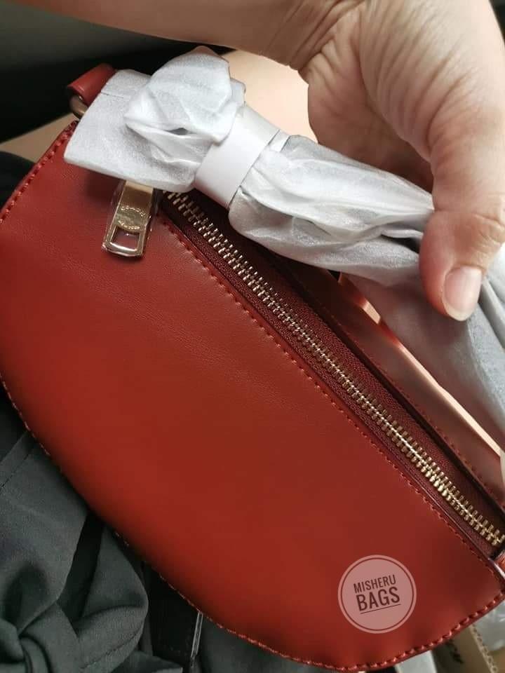 Belt bag in signature canvas with rexy by guang yu top