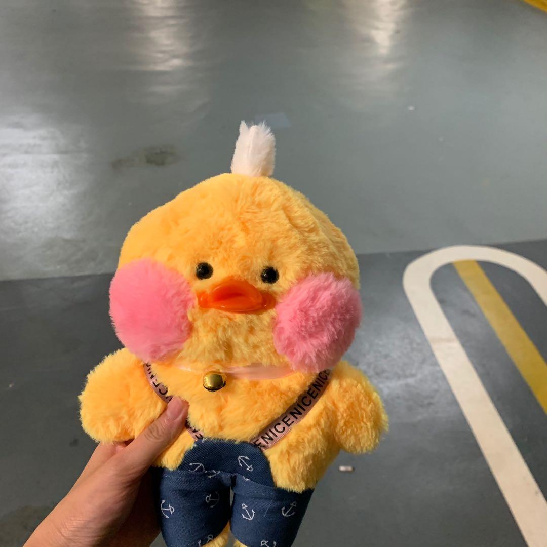 duck plush with pink cheeks