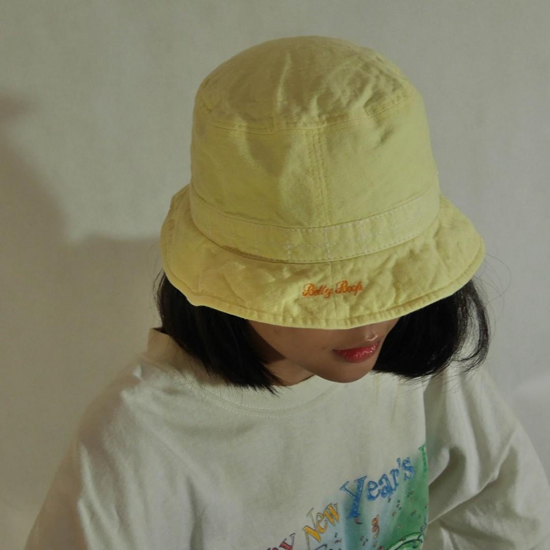 pastel yellow bucket hat