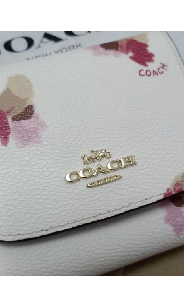 Coach trifold wallet (Category: Luxury Bags & Wallets) located in Manila. Submitted by shop.stylestaple (Listing ID 236263145, Image 3). Description: Coach Trifold Wallet (Pink Floral) Condition: 9.5/10 used once only (almost brand new) w dust pouch and paper bag 3,600php only Guaranteed authentic .