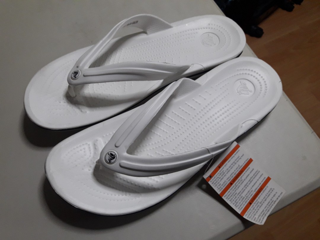 crocs silver flip flops