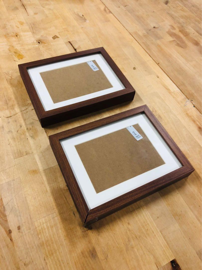 Ikea Frames (Read Description) (Category: Frames & Pictures) located in Singapore. Submitted by slowloriis (Listing ID 236198815, Image 1). Description: Price is fixed and is for both frames. No individual sales. Selling on behalf of a family member. Used but still in good condition. Not for fussy. Item pickup only near Orchard area. Specifications: 26.5cm x 20.5cm (Edge to edge of frame) 17cm x 12cm (Area for placing photo) .