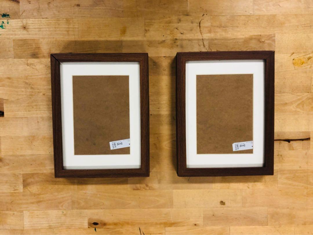 Ikea Frames (Read Description) (Category: Frames & Pictures) located in Singapore. Submitted by slowloriis (Listing ID 236198815, Image 2). Description: Price is fixed and is for both frames. No individual sales. Selling on behalf of a family member. Used but still in good condition. Not for fussy. Item pickup only near Orchard area. Specifications: 26.5cm x 20.5cm (Edge to edge of frame) 17cm x 12cm (Area for placing photo) .