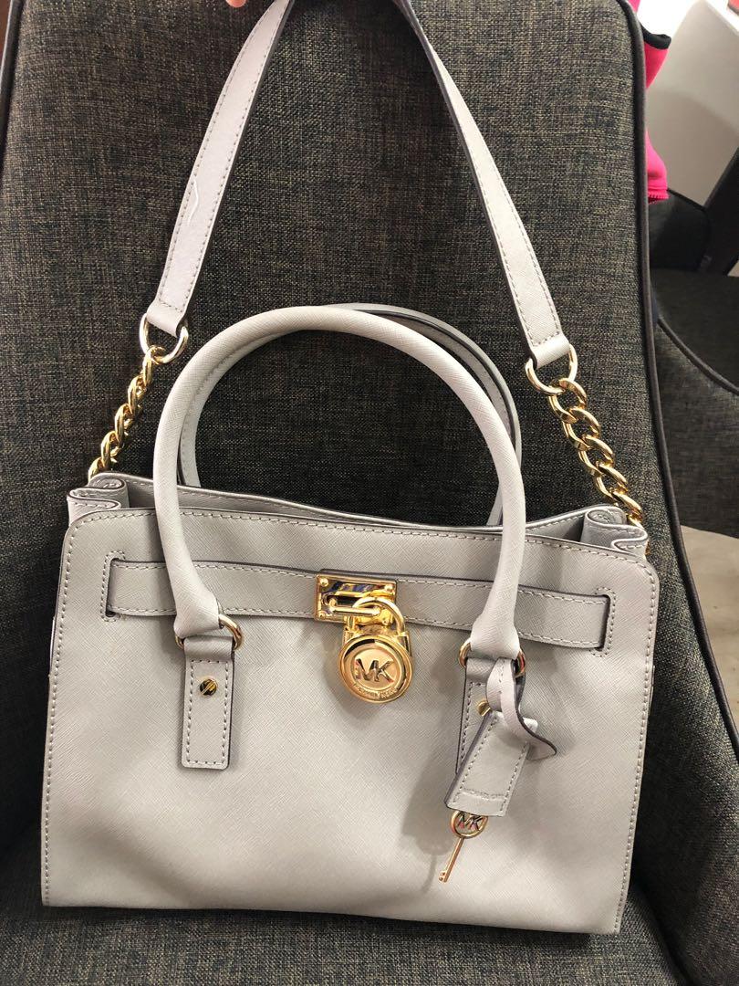 Michael kors purse shop with lock and key