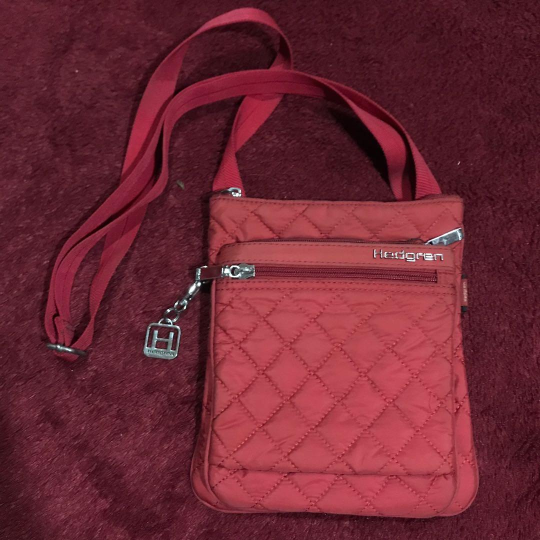 Authentic Red Hedgren Sling bag, Men's Fashion, Bags, Sling Bags on