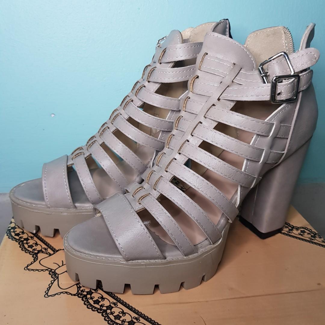 grey high heel shoes