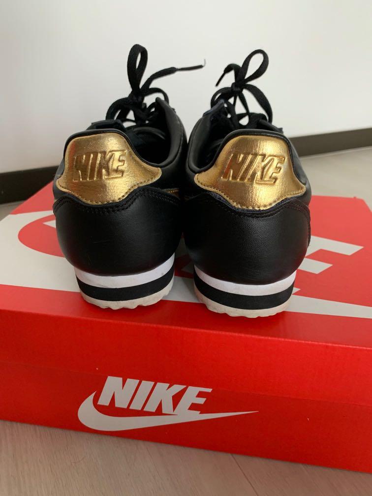 Black nike cortez with gold swoosh deals