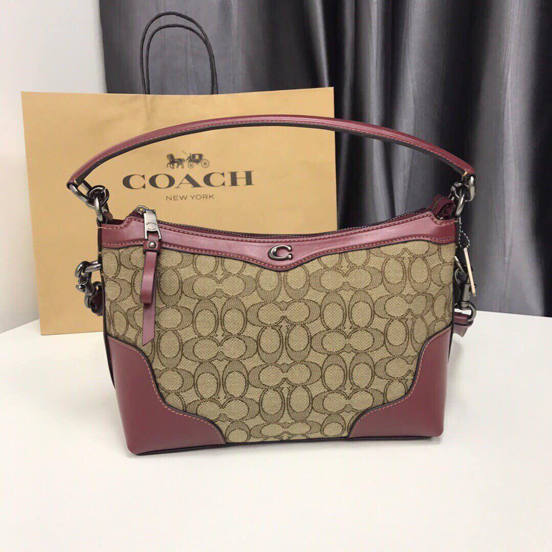 Authentic coach small east west ivie shoulder Bag insignature jacquard