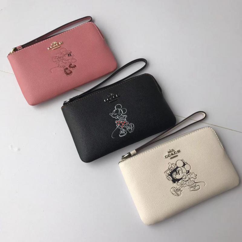 mickey mouse coach wristlet