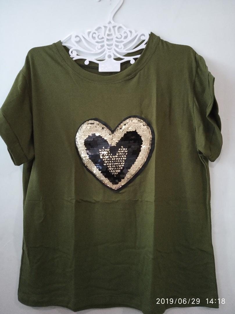 Sequence design Tee shirt (Category: Shirts) located in Cainta. Submitted by windrea (Listing ID 236675950, Image 1). Description: Sequence design Tee shirt Fabric: Cotton spandex Fits med- xl size Army green color Golden heart design.