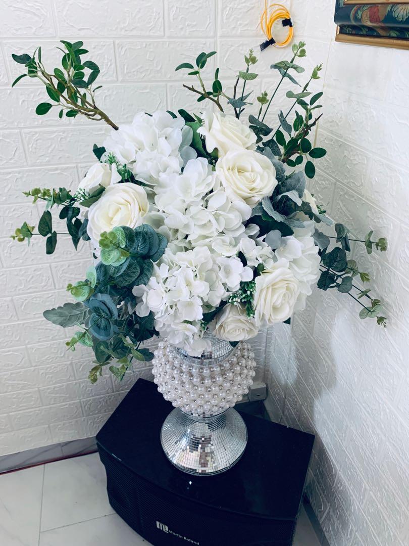 Chrome vase with white flower exclusive with arrangement done