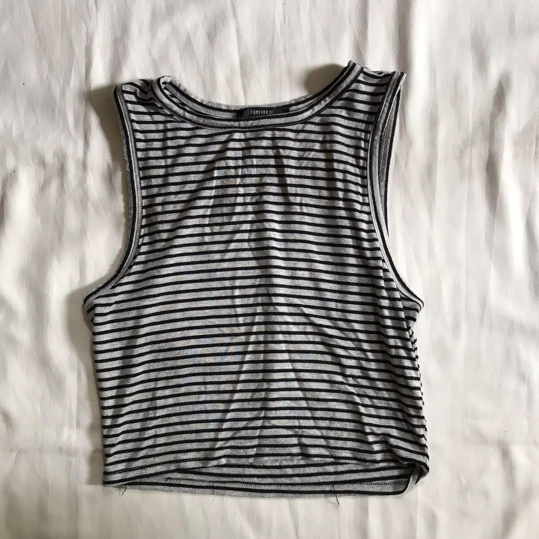 Forever 21 striped sleeveless crop top (Category: Sleeveless) located in Manila. Submitted by boldcloset (Listing ID 236944274, Image 1). Description: Forever 21 Striped sleeveless crop top - gray and black stripes - fits s/m - payment via bdo(deposit).
