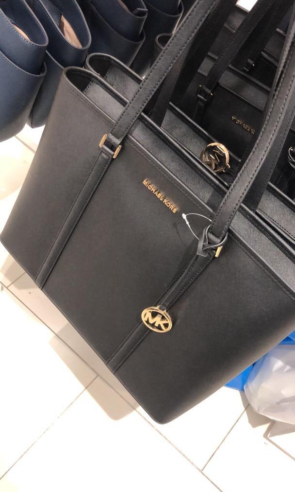 Michael kors bag that fits laptop cheap